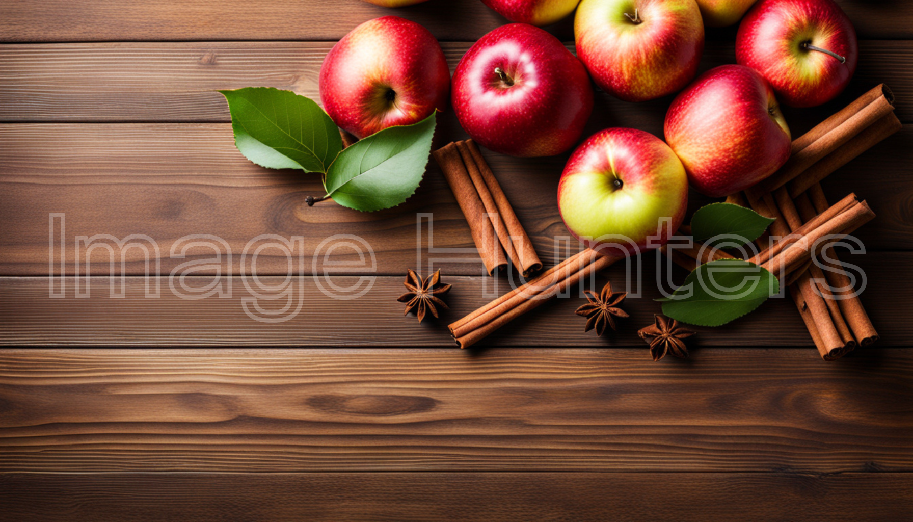 Top View of Apples and Cinnamon on Wooden Table