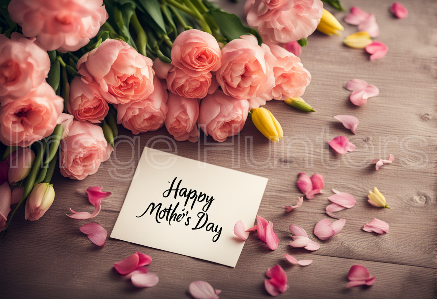 Postcard and flowers on the table, celebrating Happy Mother's Day